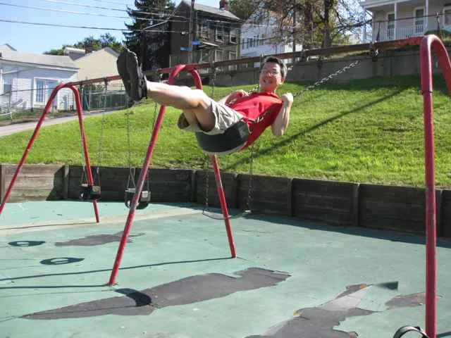 Franklin on swing at the Eleanor Street parklet