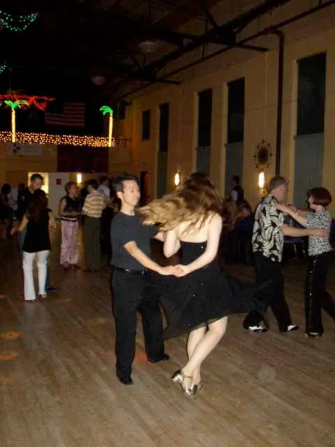 Abby and Franklin dancing salsa at Palisades, hair flying