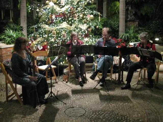 Recorder quartet playing Deck the Halls