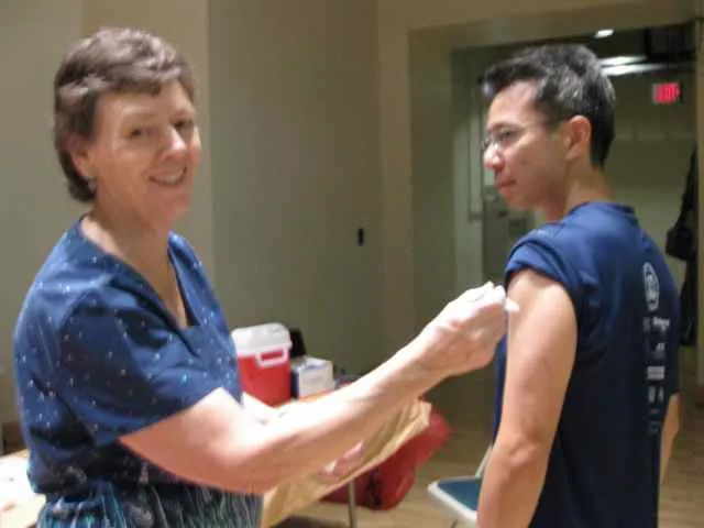 Franklin getting flu shot at CMU in 2011