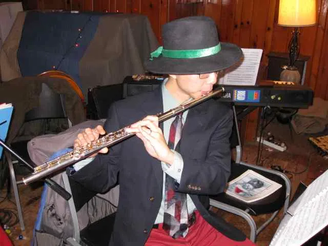 Franklin posing with flute