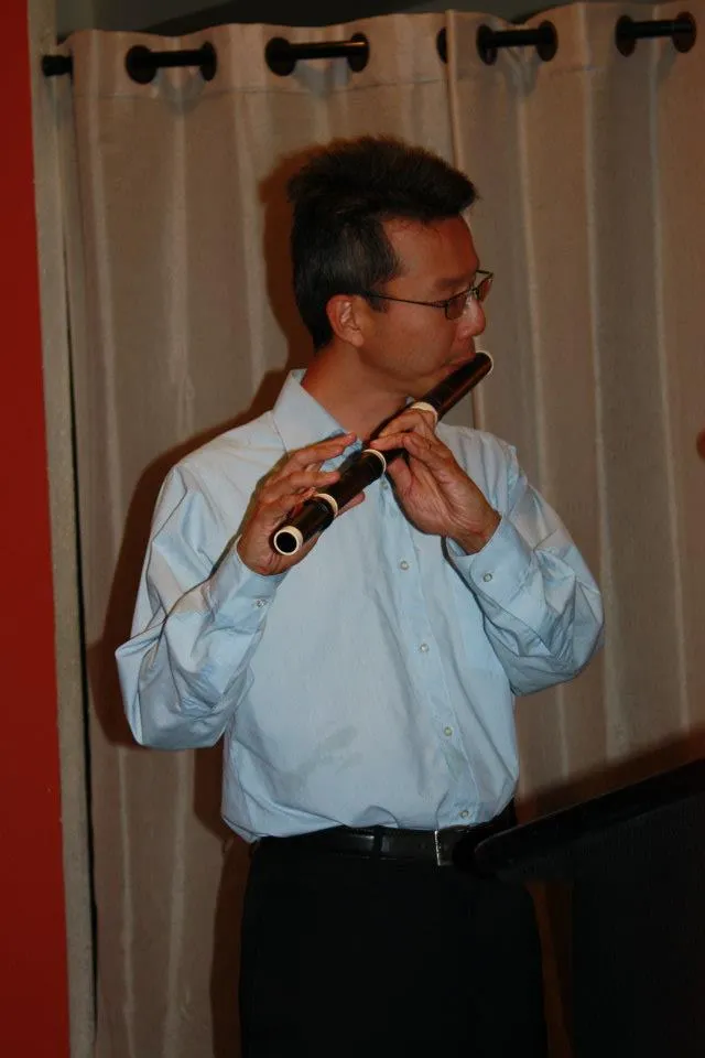Franklin playing Baroque flute