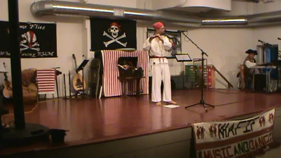 Franklin as pirate playing Irish flute
