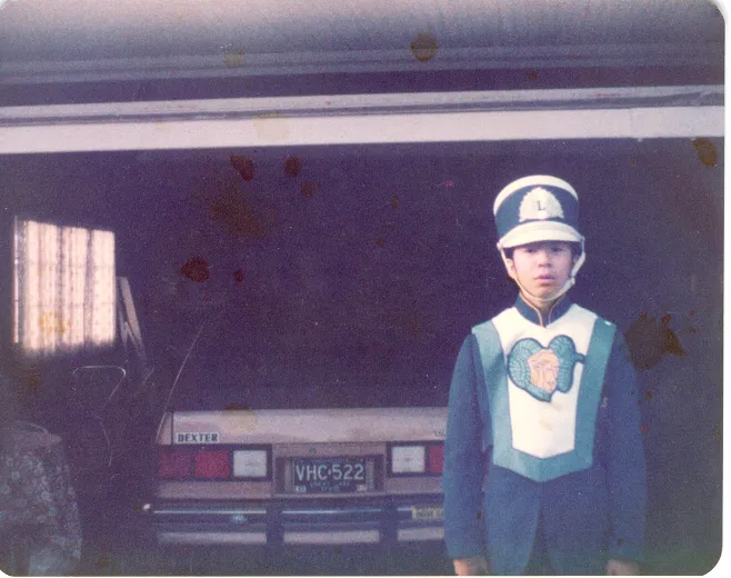 Franklin in Lamphere High School marching band uniform