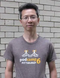 Franklin wearing the PodCamp 6 T-shirt