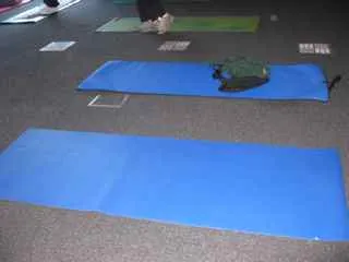 [Yoga mats in place]