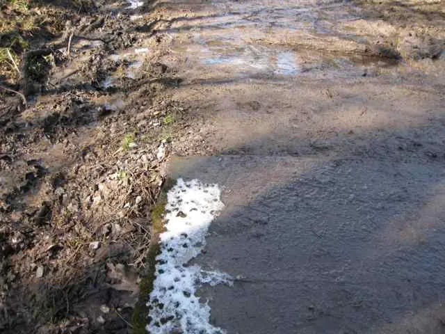 Snow and mud on trail